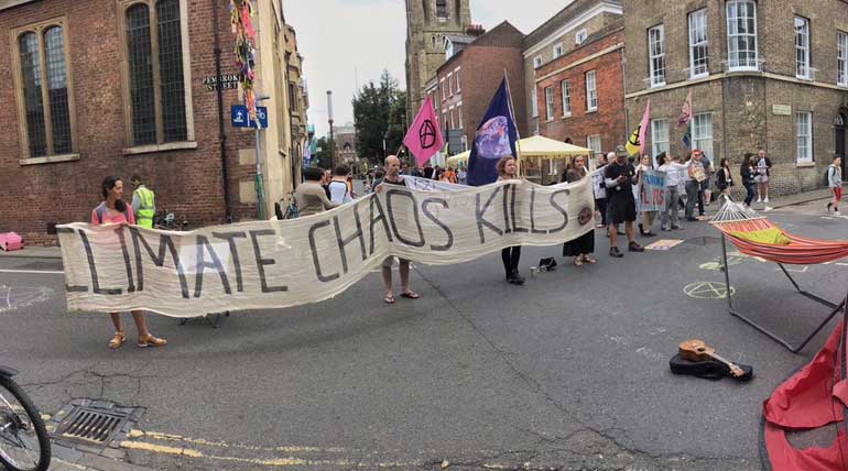 Climate Change Protest. Extinction Rebellion and their efforts to create a car-free environment in the Cambridge city center Photo Isabel Realyvasquez