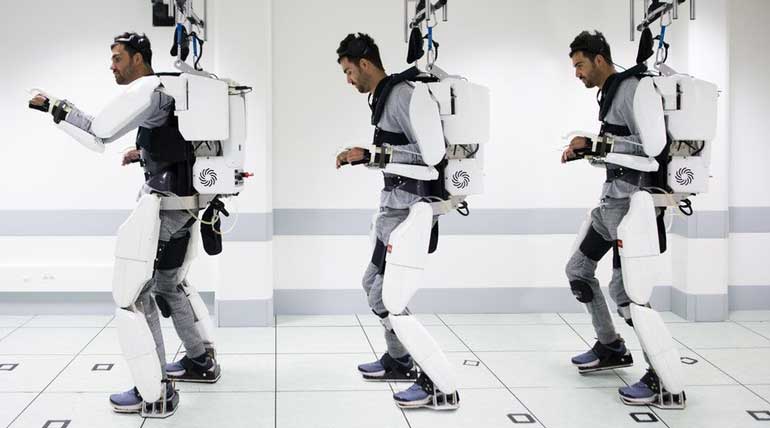 Mind-controlled Exoskeleton - paralysis walk. Photo Clinatec