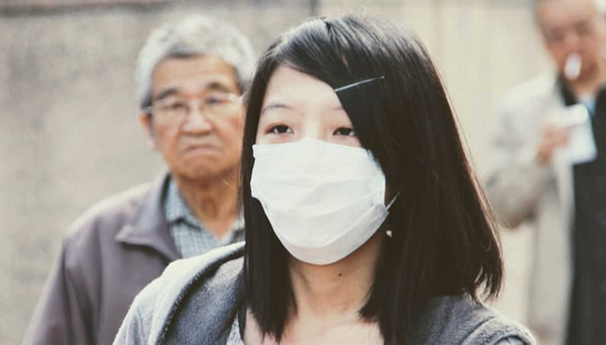 Woman Wearing Surgical Mask