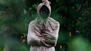 Pocong Ghost Patrolling in Indonesia