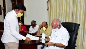 Karnataka CM with donation checks