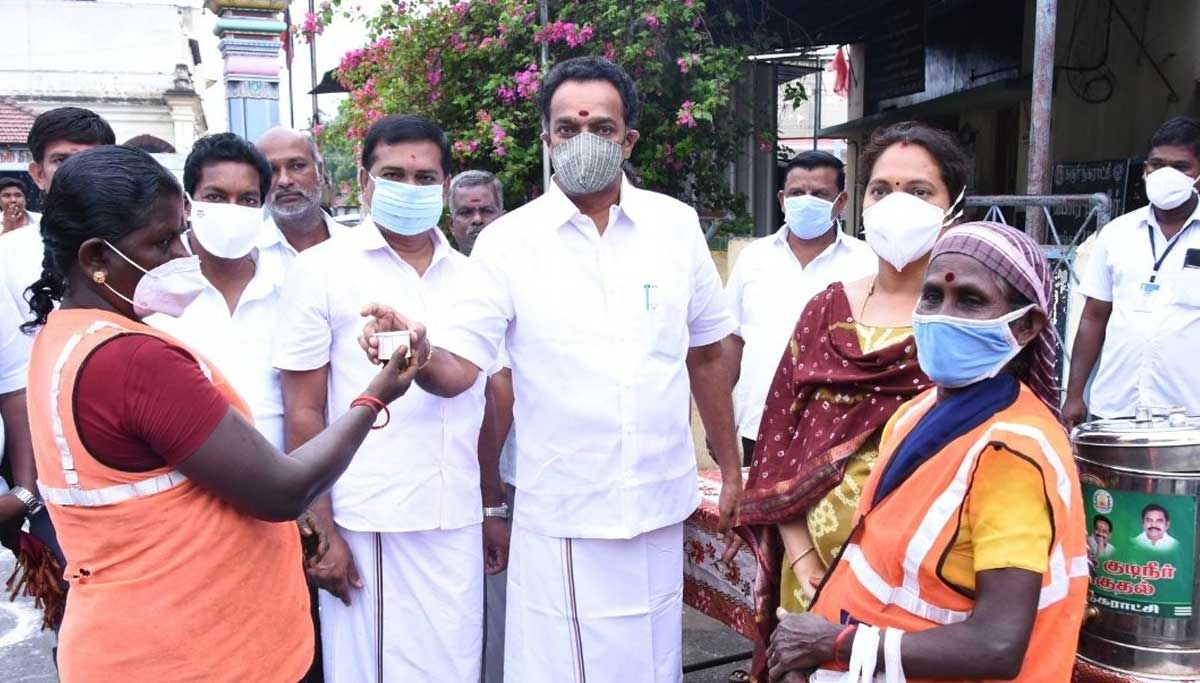 Minister Vijayabasker offers Health Drink to Karur panchayat staff